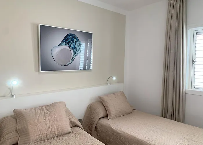 Acuario Close To The Апартаменты Тиас